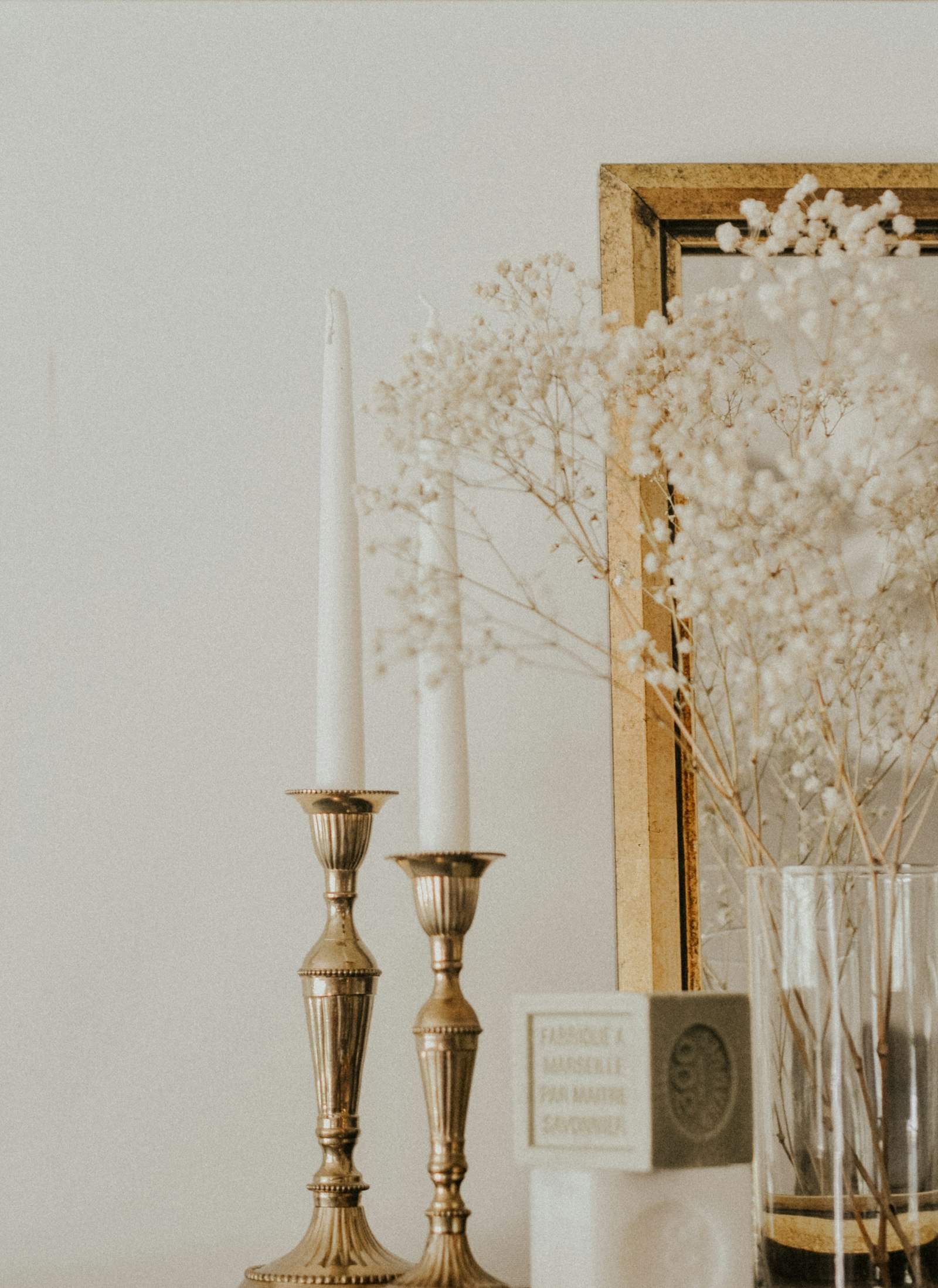 Brass candlesticks styled on a shelf