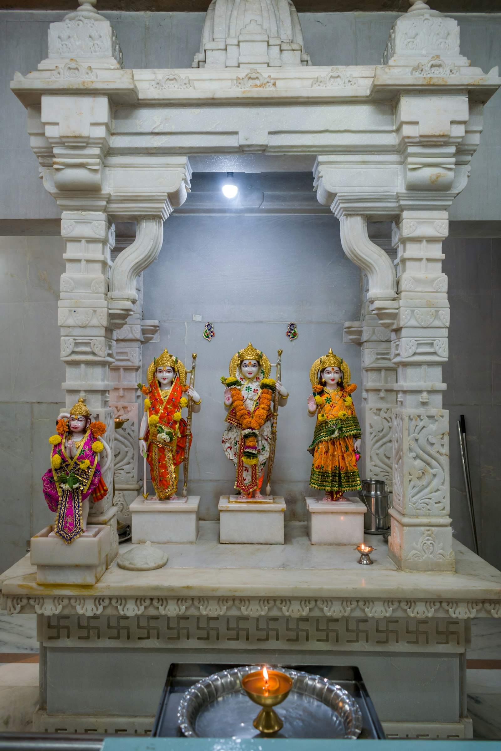 Marble mandir with hand-dressed deity murtis